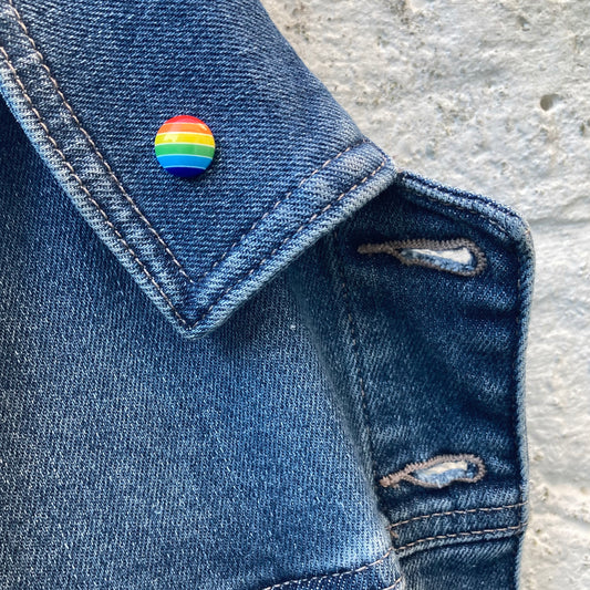 LGBT Pride rainbow brooch - colorful pride pin badge close-up"