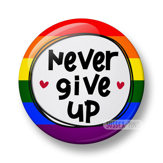Never Give Up Pin Badge – 32mm or 44mm
