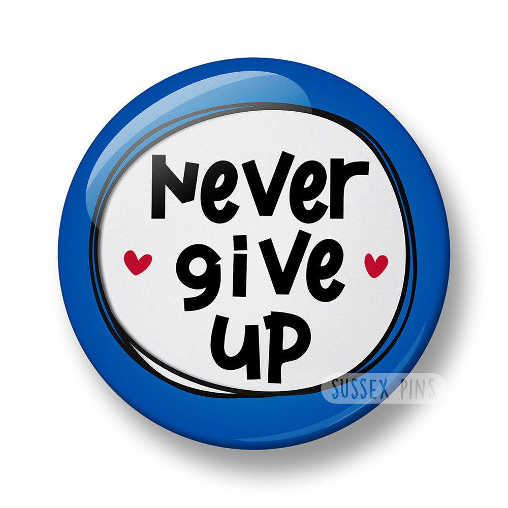 Never Give Up Pin Badge – 32mm or 44mm