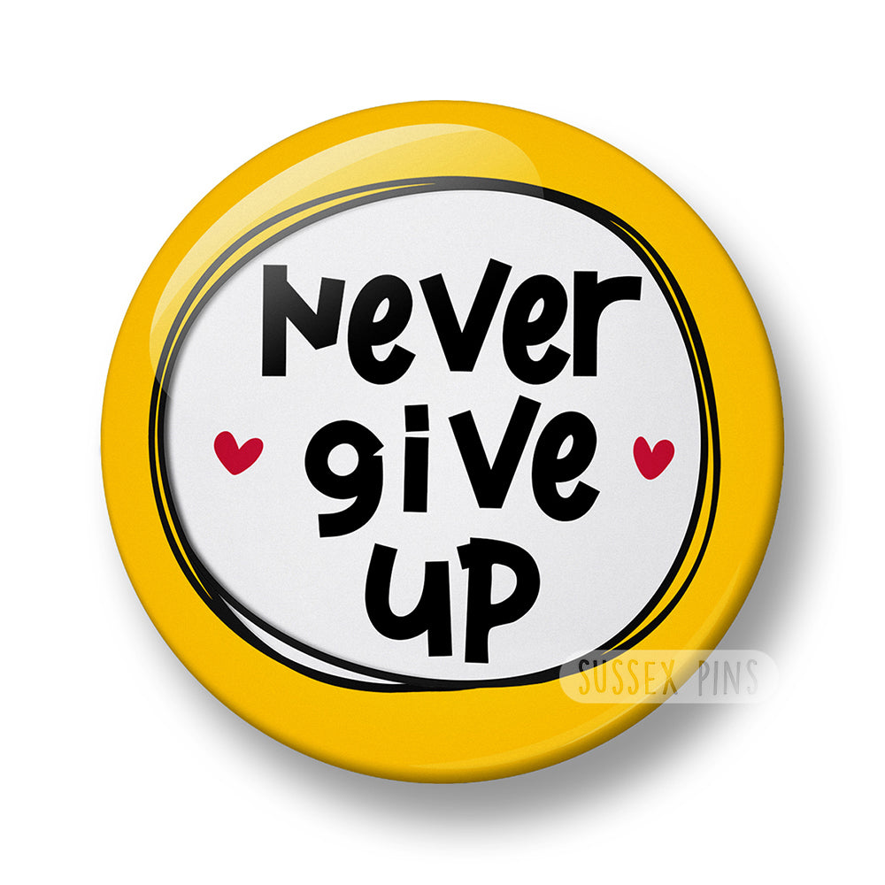 Never Give Up Pin Badge – 32mm or 44mm